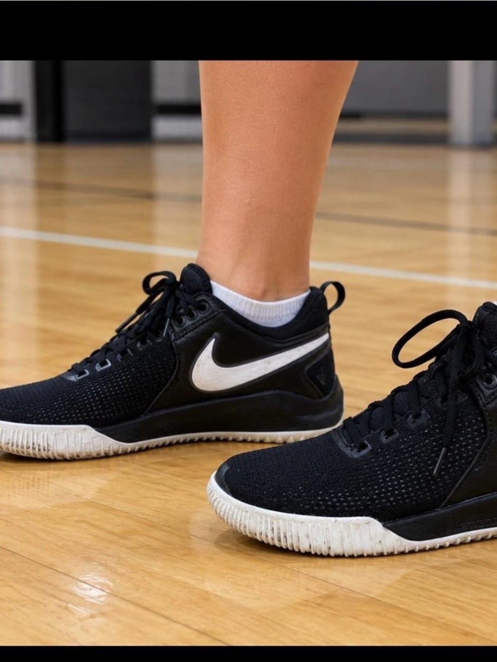 Nike Women's Black Sneakers with White Swoosh
